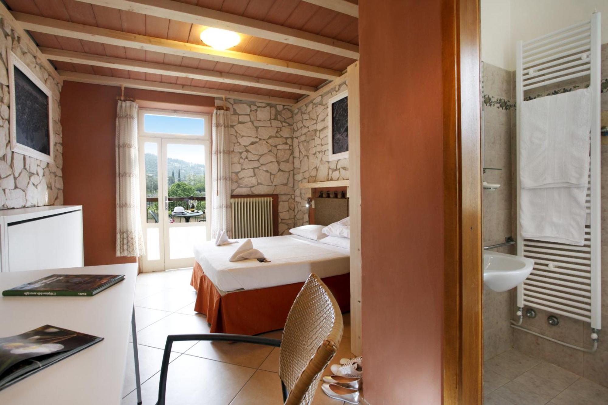 Albergo Garni Orchidea ริวาเดลการ์ดา ภายนอก รูปภาพ